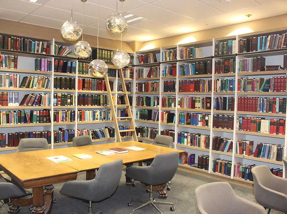 Pendant lighting over the reading table at Huguenot Chambers Library